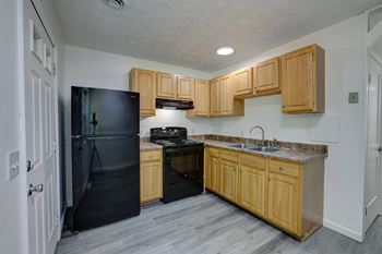 Plank flooring in kitchen, dining and living rooms*